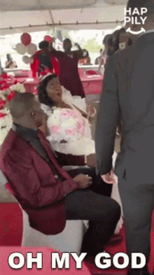 a man in a suit is standing next to a woman in a wedding dress and says oh my god on the bottom