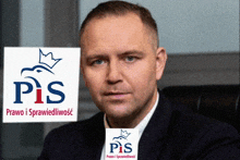 a man in a suit is sitting in front of a sign that says pis