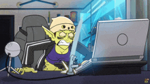 a cartoon of a goblin sitting in front of a computer
