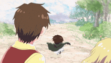 a boy in a red vest is looking at a boy in a green cape