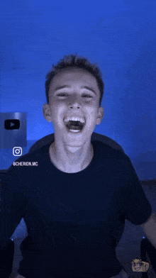 a young man is laughing with cherion.mc written on the bottom