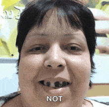a close up of a woman 's face with the words not written on the bottom