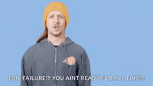 a man in a yellow beanie is pointing at his head with the words " you had one job " written above him