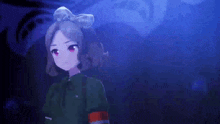 a girl with a bow on her head is standing in the dark .