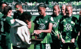a group of soccer players including number 23