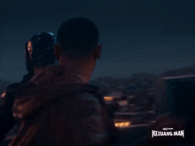 a blurred image of a man with the words keluarg man on the bottom right corner