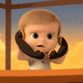 a baby from the boss baby is talking on a telephone .