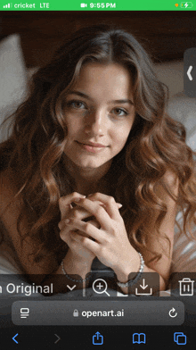 a cricket lte phone shows a picture of a woman with her hands folded