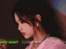 a close up of a woman 's face with the words nighty night in the corner