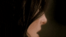 a close up of a woman 's face and nose