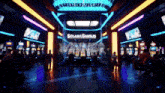 people playing slot machines in a casino with a sign that says solana gambles
