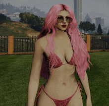 a woman with pink hair is wearing sunglasses and a bikini top