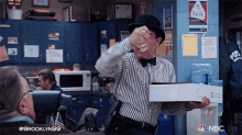 Delivering Package Charles Boyle GIF - Delivering Package Charles Boyle Brooklyn Nine Nine GIFs