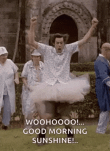 a man in a tutu is jumping in the air with his arms in the air and says good morning sunshine .