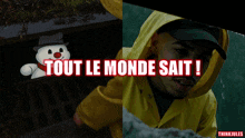 a man in a yellow raincoat is standing next to a snowman that says tout le monde sauf