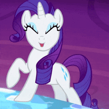 a white pony with a purple mane and tail is standing in the water