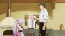 a man and a little girl are cooking together