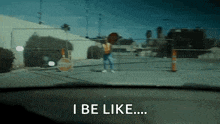 a person holding a stop sign says i be like ...