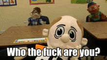 a classroom with stuffed animals and the words who the fuck are you