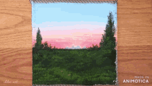 a painting of a sunset with trees in the foreground is made in animatica