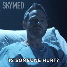 a man in a hospital bed with the words " is someone hurt " above him
