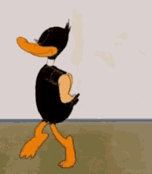 Daffy Duck Strip GIF - Daffy Duck Strip Undress GIFs