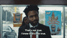 a man in a suit says that 's not true