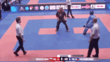 a blurred image of a karate match between bulgaria and the philippines