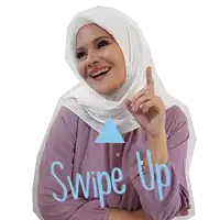 a woman wearing a white hijab and a purple shirt has the words swipe up written on her sleeve