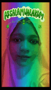 a girl wearing a hijab with the words assalamualaikum written on it