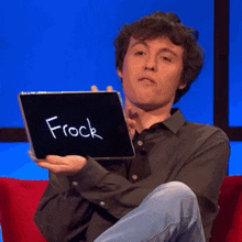 a man is holding a tablet that says frock