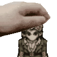 a hand is holding a cartoon character on top of another cartoon character .