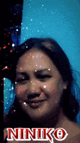 a picture of a woman with the name niniko on it