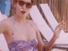 shades on summer vacation relaxing tanning florence and the machine gif