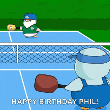 a cartoon of two penguins on a tennis court with the words happy birthday phil