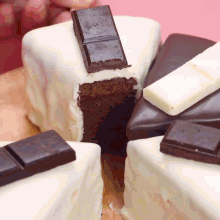 a slice of chocolate cake with a slice missing