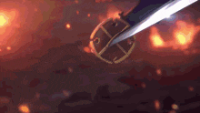 a close up of a person holding a sword