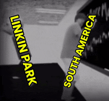 a black and white photo of a man with the words linkin park south america on the bottom