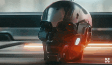 a futuristic helmet with the number 10 on the front
