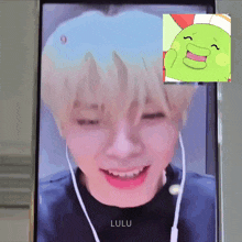 a phone with a picture of a boy and the word lulu on it