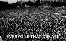 a large crowd of people at a concert with the words `` everyone that did ask '' .
