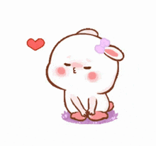 a cartoon rabbit with a bow on its head and a heart behind it .