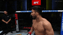 two men are fighting in a ring with a banner that says impossible on it