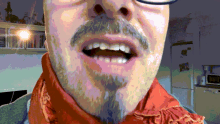 a pixelated image of a man with glasses and a beard