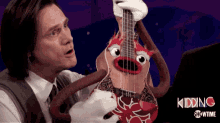 Playing Guitar Puppet GIF
