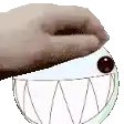 a hand is holding a drawing of a shark 's mouth with sharp teeth .