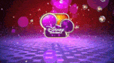 the disney channel logo is surrounded by bubbles on a purple background .