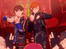 a couple of anime characters standing next to each other on a stage