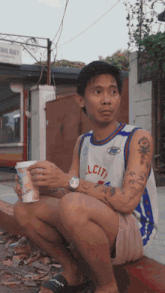 a man wearing a jersey that says " lcit " on it