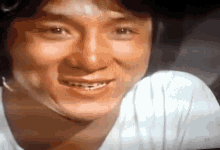 jackie chan watching cat and snake fight